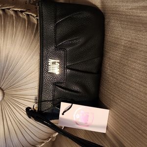 Juicy Couture NWT Wristlet Black. Lined, zipper pocket inside, card holders